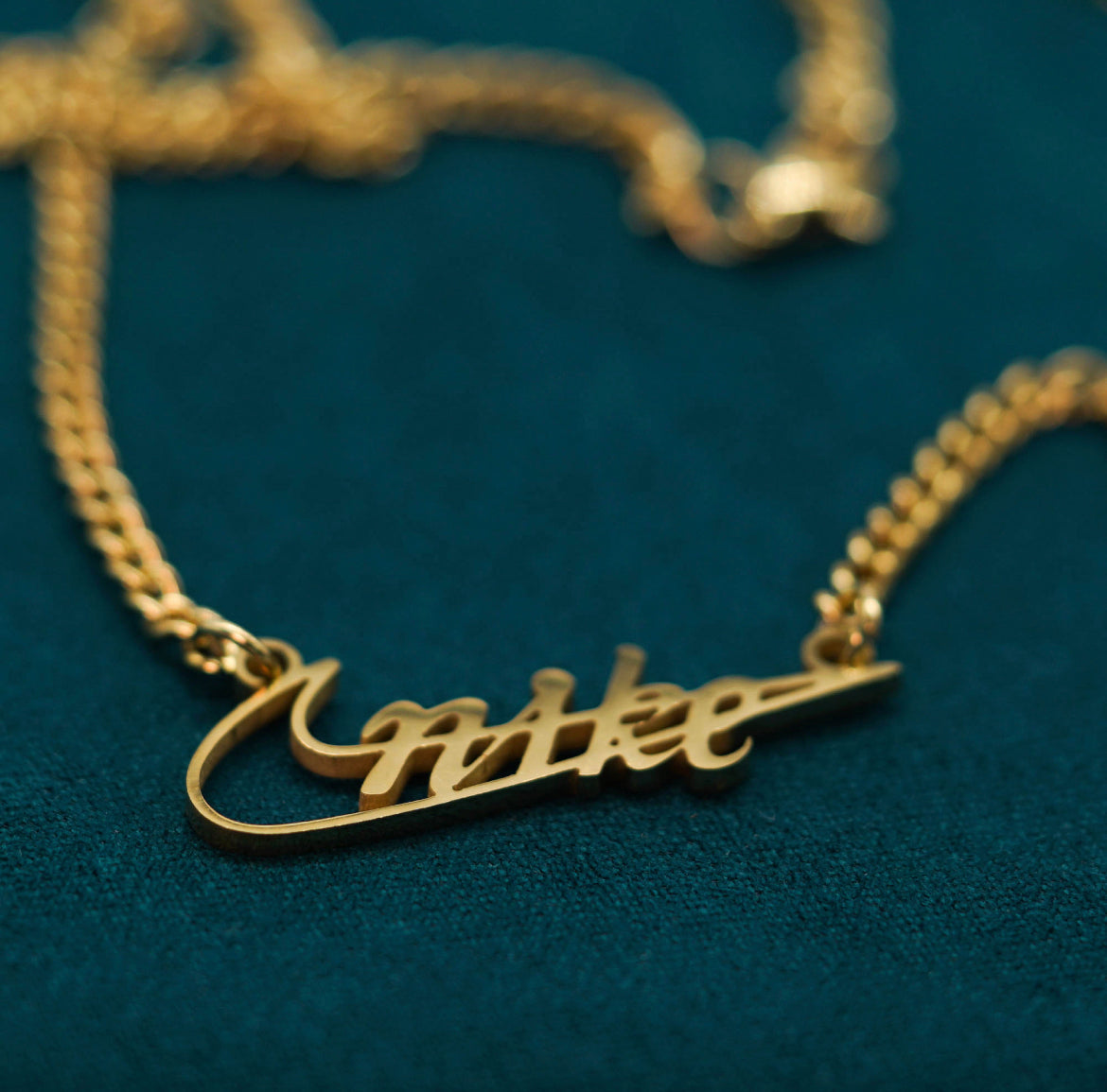 Gold Nike Pendant Necklace