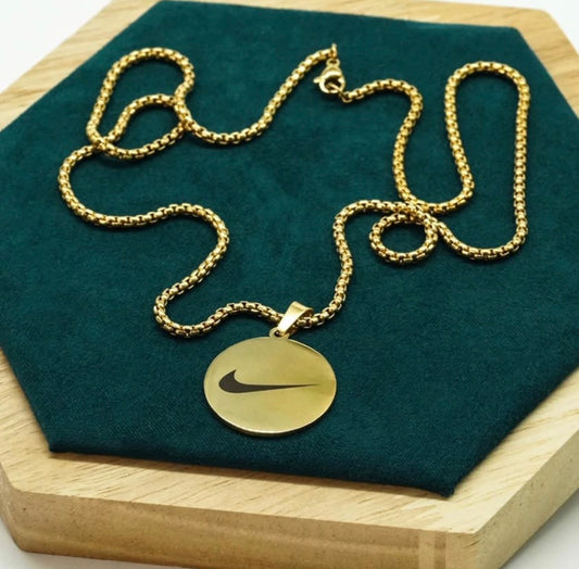Gold Nike pendent necklace